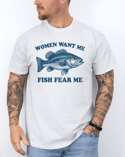 Model wearing ash color shirt with 'Women Want Me Fish Fear Me' graphic design